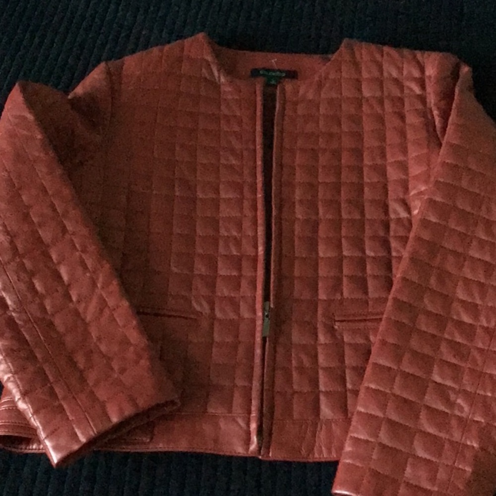 Red genuine leather jacket. Quilted leather, size L but fits like a medium
